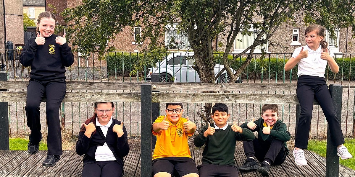 Pupils from Bainsford Primary give their report a big thumbs up!