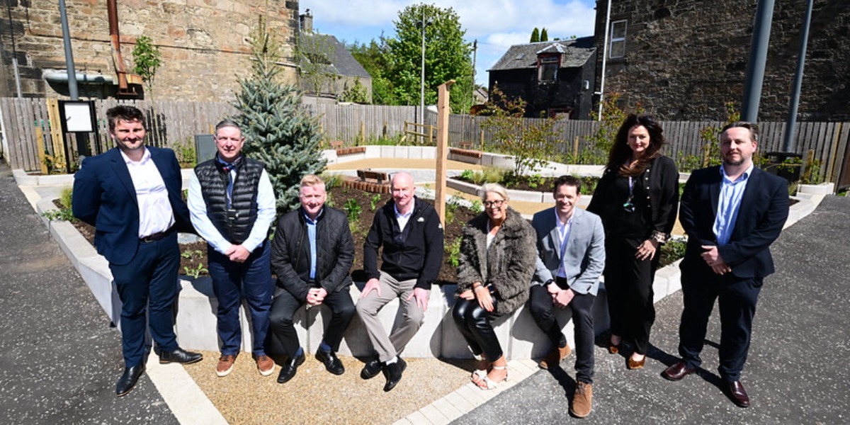 📷 Councillor Paul Garner, Acting Leader of Falkirk Council, with local Councillor Claire Mackie-Brown and Council officers at the new pocket park.